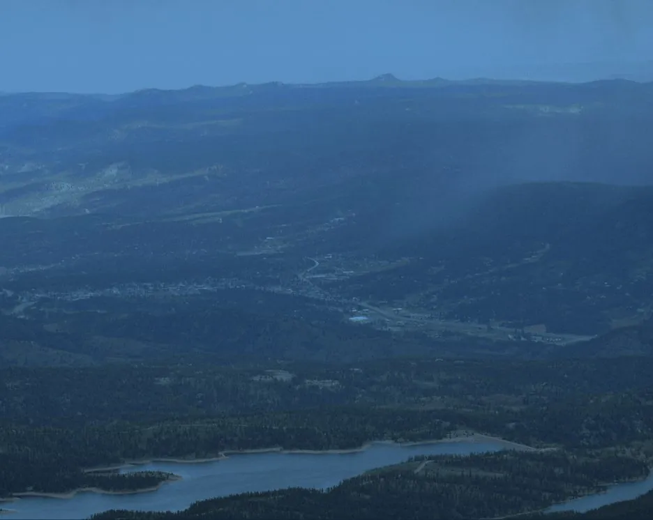Mountain lake and river valley in the Rocky Mountain West